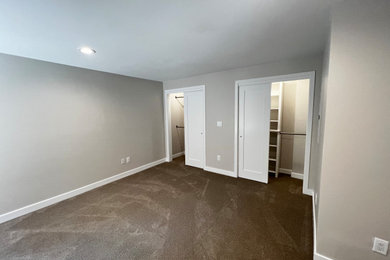 Bedroom - transitional carpeted and brown floor bedroom idea in Boston with gray walls