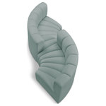 Meridian Furniture - Arc Vegan Leather Upholstered 4-Pc. Facing Modular Sectional, Green - Unleash modern opulence with the Arc Vegan Leather 4pc. Sectional. Crafted for the modern connoisseur, this Sectional injects an air of refined luxury into any space. Its sleek silhouette, upholstered in supple mint green vegan leather, exudes timeless sophistication while the deep channel tufting adds textural intrigue, further elevating the chair's visual appeal. The modular design makes it a versatile chameleon, effortlessly adapting to your evolving needs and preferences. Whether you envision it gracing a chic living room corner, basking in the glow of a bedroom window, or adding a touch of drama to a home office, the Arc seamlessly complements your unique interior aesthetic.