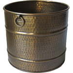Excellent Accents Inc. - Solid Brass Planter, 13"W x 12"H Available in 3 sizes. - Solid brass planter with solid cast brass handles and fittings.  Diameter 13,"  Height 12."  This solid brass planter is constructed with a top-rolled edge and is individually hand-hammered and hand-detailed for deep finish luster and unique character.  Each planter is lacquered to resist tarnishing.  Thick solid brass construction means this planter can be used outdoors too.  If used outdoors the planter will gradually patina depending on the degree of weather exposure.   Because this product is hand-made, dimensions or finish patina can vary slightly.   Available in 3 sizes:  13"W x 12"H,  14.75"W x 13.5"H,   17"W x 16"H.      Great for fireside kindling storage too.  An Excellent Accents exclusive item.  No drain holes.  Ships by FedEX Ground.  Cannot ship to a P.O. Box.  Ships to continental USA only.