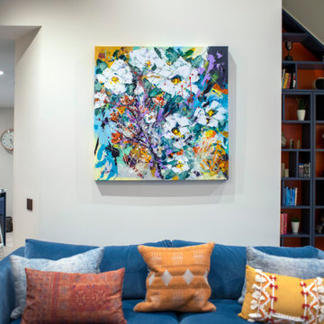 View towards the snug area. Artwork chosen to compliment the interior design.