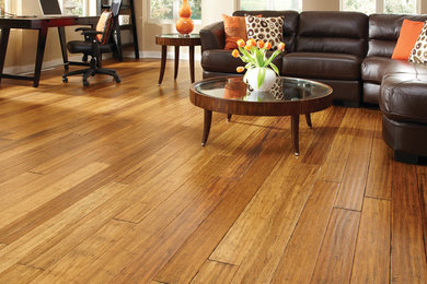 Inspiration for a mid-sized transitional formal and enclosed bamboo floor and brown floor living room remodel in Other with beige walls