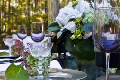 Example of a small trendy backyard stone patio design in Other