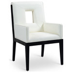 Meridian Furniture - Gwendolyn Upholstered Dining Arm Chair, Cream, Vegan Leather, Black Finish - A masterpiece of modern elegance and comfort, the Gwendolyn cream vegan leather dining armchair is where modern design meets timeless charm. Designed with comfort in mind, it features a high back and luxurious cushioning, perfect for long dinners or lively gatherings. The black wood frame adds a rustic touch, effortlessly balancing the contemporary fabric with a hint of warmth and tradition.