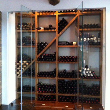 Contemporary Wine Cellar with refrigeration by Kessick