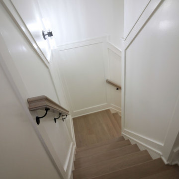 Project #93 | Captivating Staircase with Light Wood and Black Spindles