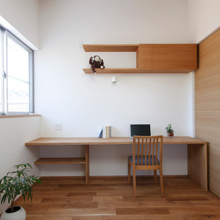 Inspiration for a world-inspired home office and library in Other.