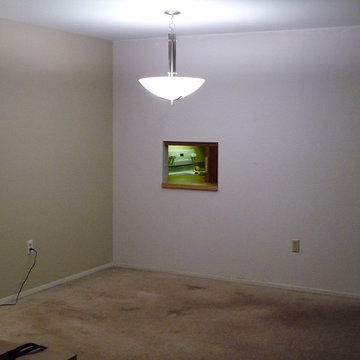 Small pass-through window between dining and kitchen area prior to renovation