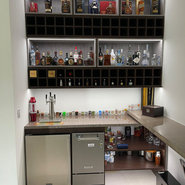 Architectural Millwork + Wall Paneling with Hidden Door + Bar area