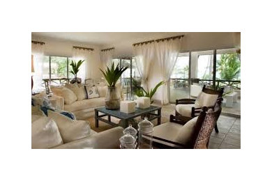 Elegant living room photo in San Diego with a bar