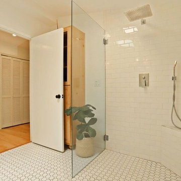 White Bathroom with Glass Shower Enclosure