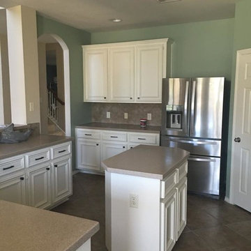 Cabinet refinishing with new backsplash