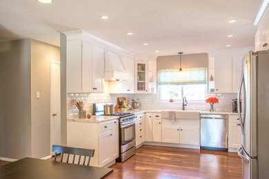 Kitchen - small transitional kitchen idea in Denver