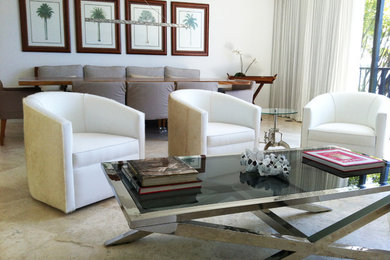 Photo of a mid-sized modern open concept living room in Miami with white walls, limestone floors and beige floor.