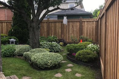 Example of an exterior home design in Toronto