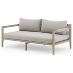 Four Hands - Sherwood Outdoor Sofa, Washed Brown,Stone Grey / 63" - Modern materials ready a stylish silhouette for the outdoors. Washed brown teak forms a linear frame for UV-resistant and water-repellent Sunproof fabric in a textural sand, ash, and Navy. Rope-wrapped armrests and rear cotton weaving add a textured finishing touch. Cover or store indoors during inclement weather.