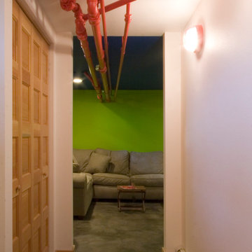 Why not leave the plumbing/heating infrastructure visible? Our clients loved thi