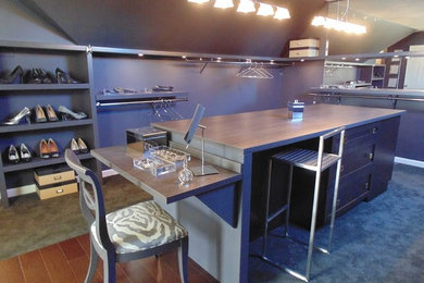 Dressing room - large contemporary gender-neutral carpeted and gray floor dressing room idea in Indianapolis with flat-panel cabinets and gray cabinets
