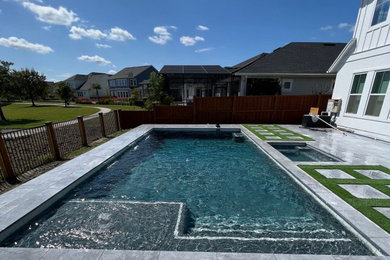 Inspiration for a modern pool remodel in Orlando