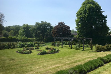 Rose garden with borders and pergola