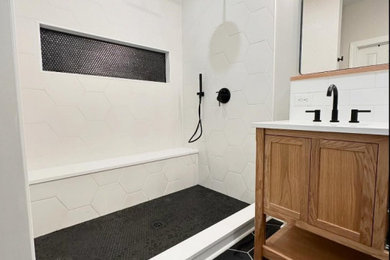 Inspiration for a large country master gray tile double-sink bathroom remodel in Charleston with shaker cabinets, light wood cabinets, quartzite countertops, white countertops and a built-in vanity