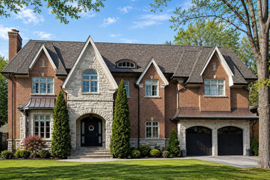 Huge elegant multicolored two-story mixed siding exterior home photo in Toronto with a shingle roof and a brown roof