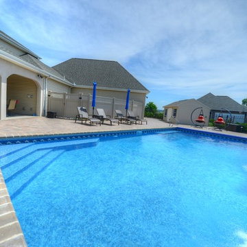 Traditional Pool with Retractable Cover