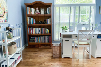 Freestanding desk brown floor home office photo in Raleigh