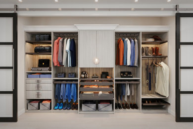 Inspiration for a modern men's closet remodel in Los Angeles
