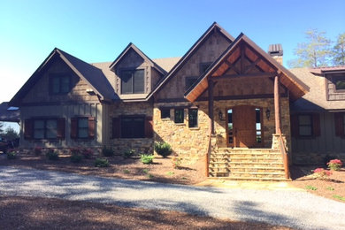 Rustic exterior home idea in Other