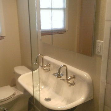 BATHROOM - Calcutta Gold Marble Shower / Gray Penny Tile Floor