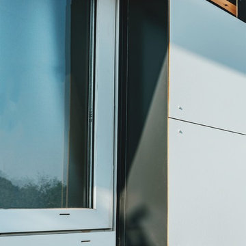 FASSADENBEKLEIDUNG - mit Isolierung, Rockpanel in Reinweiß & Anthrazit