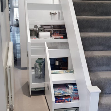 Unde rstairs storage with pull outs