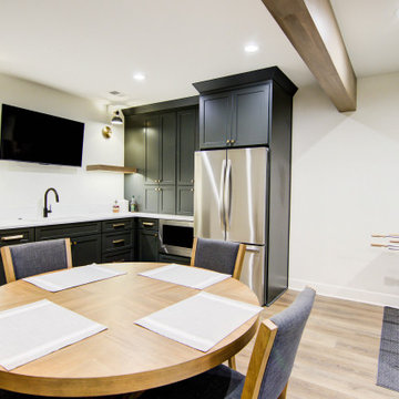 Warm & Inviting Basement Retreat with Kitchenette and Reading Nook