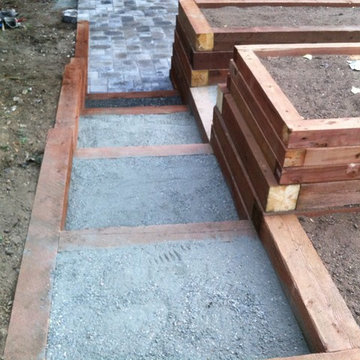 Garden planters over paver patio