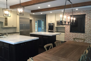 Farmhouse home design photo in Philadelphia