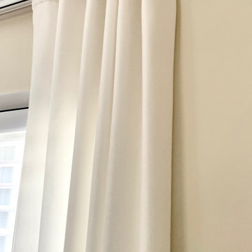 Ripple Fold Drapery Side Panels on a Kirsch Ripple Fold Track in Living Room