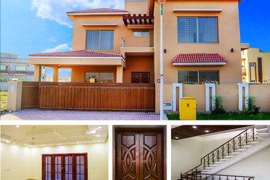 Example of a trendy house exterior design in Other