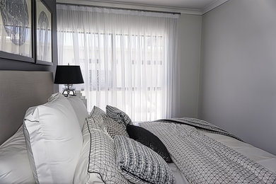 This is an example of a modern master bedroom in Brisbane.