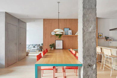 Photo of a large contemporary dining room in Barcelona with light hardwood floors.