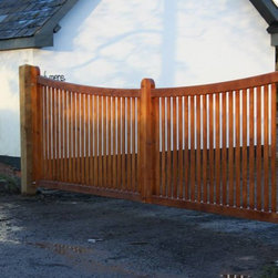 Driveway gates - Redwood (Softwood) Gates and stained using Sikkens Stain - Products