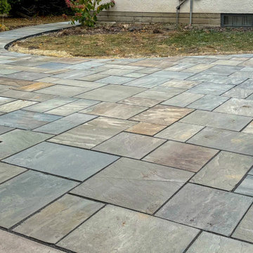 Custom Natural Blue Stone Patio & Raised Planting Bed – Minneapolis