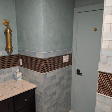 Subway Tiled Bathroom w/ Penny Round Accent