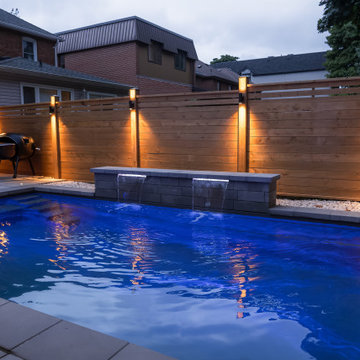 Modern Pool with Water Features & Backyard Landscape Design