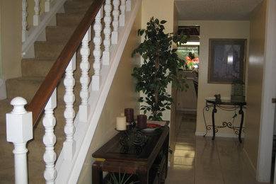 Example of a trendy home design design in Tampa