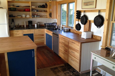 Trendy l-shaped kitchen pantry photo in Boston with a single-bowl sink, flat-panel cabinets, light wood cabinets and an island