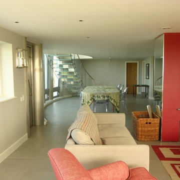 Semi Open Floor Plan, with curving glass stair to Mezanine