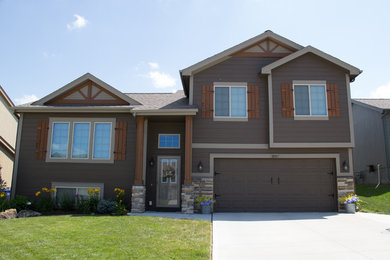 Cottage brown house exterior idea in Omaha