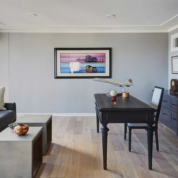 Home Office with Built In Cabinetry and Freestanding Desk