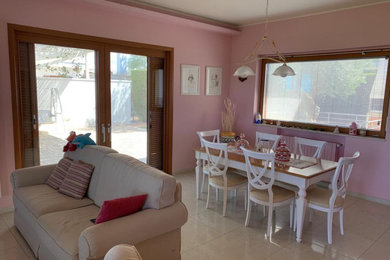 This is an example of a beach style home design in Bari.