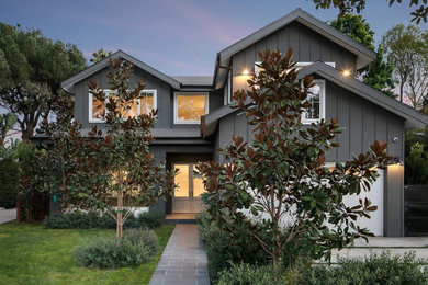 Inspiration for a modern gray two-story concrete fiberboard and board and batten house exterior remodel in Los Angeles